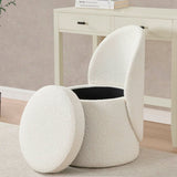 White textured ottoman with a black interior in a room setting.