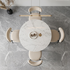 Modern pendant light fixture with marble-like surface on a gray marble background
