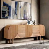 Elegant matte black Solstice Fluted Credenza by Zama Home Store, positioned on a patterned rug in a curated living space with modern home decor.