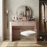 Styled luxury makeup vanity desk with a round mirror, premium storage, and elegant room decor.