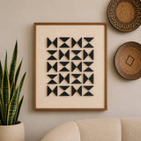 RIDGE Wall Art with black geometric shapes on linen, styled in a living room.