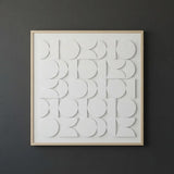 CERCLE Wall Art with white 3D circles and semi-circles in a light wood frame.