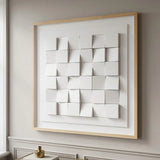 Luxora Grid Wall Art with white 3D blocks in a light wood frame, styled in a modern living room.