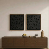 NERO Wall Art set featuring black geometric textured panels in natural wood frames.