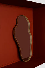 Shoe insole on a red surface