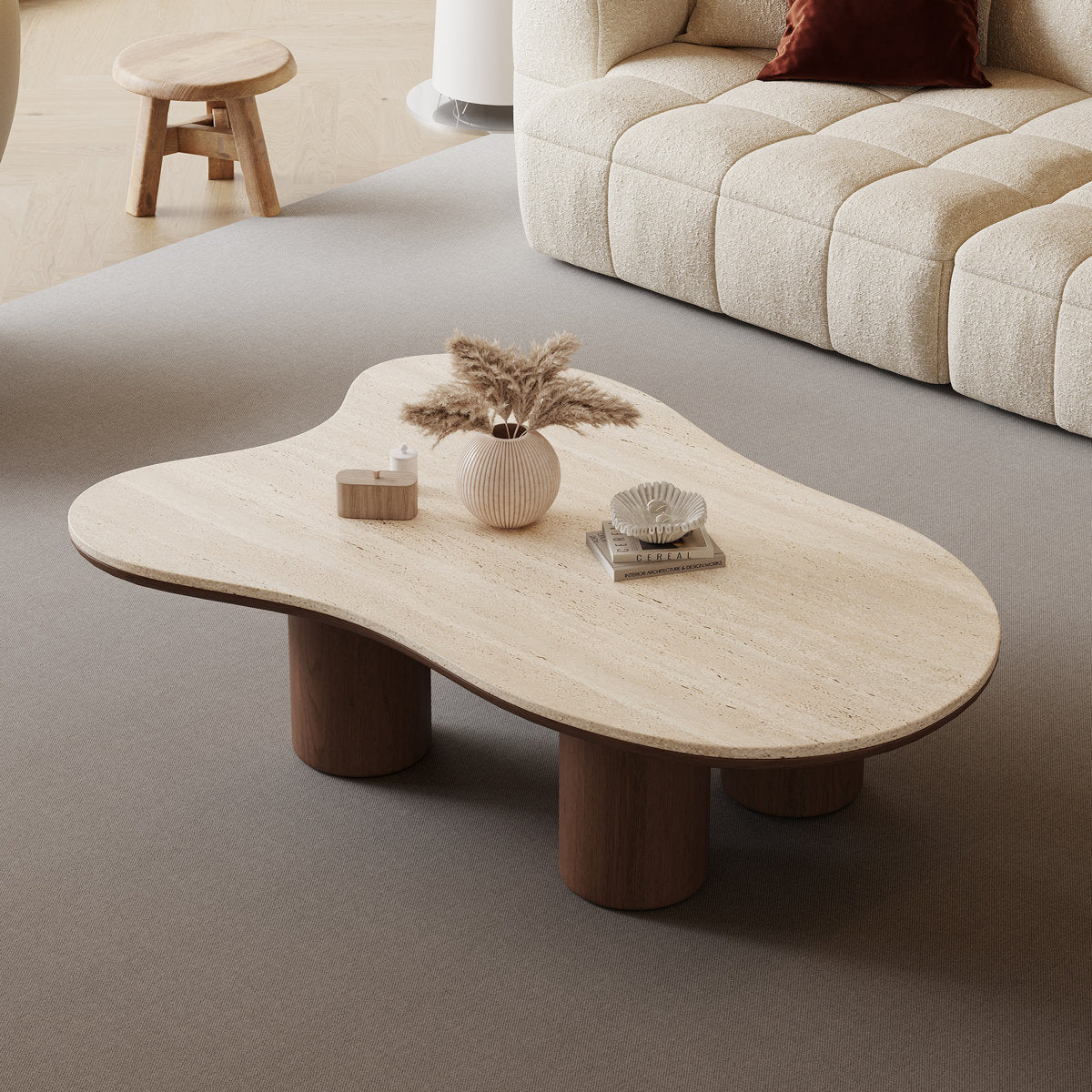 Modern coffee table with decorative items in a living room setting