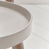 Close-up of a modern side table with a minimalist design.