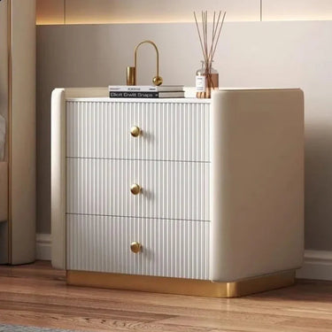Beige sideboard with gold accents in a room setting