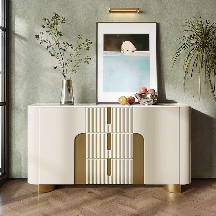 Modern sideboard with decorative items against a green wall
