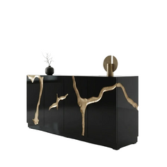 Modern black and gold cabinet with decorative elements on a white background