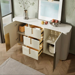 Modern kitchen island with open drawers and a decorative painting on the wall.