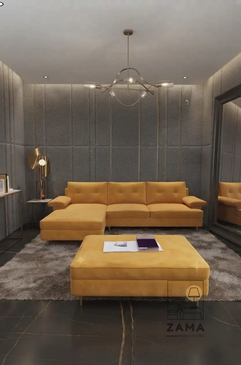 Zama Home Store mustard velvet sectional couch with chaise lounge and large ottoman in a luxurious grey living room.