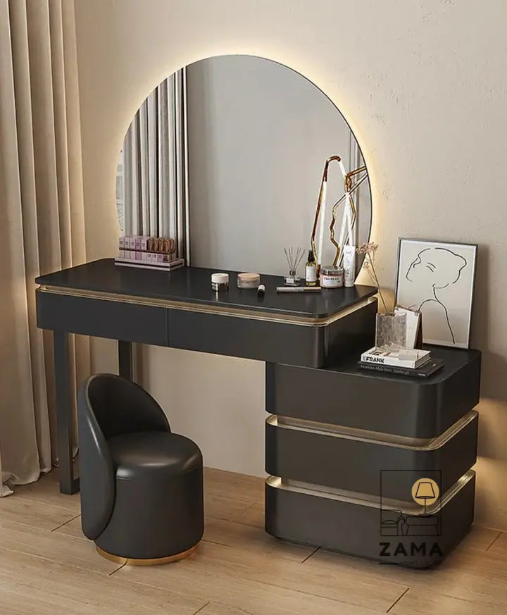 Vignette shot of modern black vanity table with integrated LED lighting, showing drawer detail and decor.