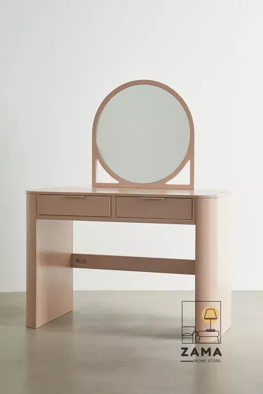 Isolated pink modern makeup vanity and dressing table with round mirror on a neutral studio background.