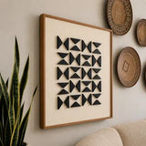 RIDGE wooden wall panel featuring raised black triangles on a neutral background.