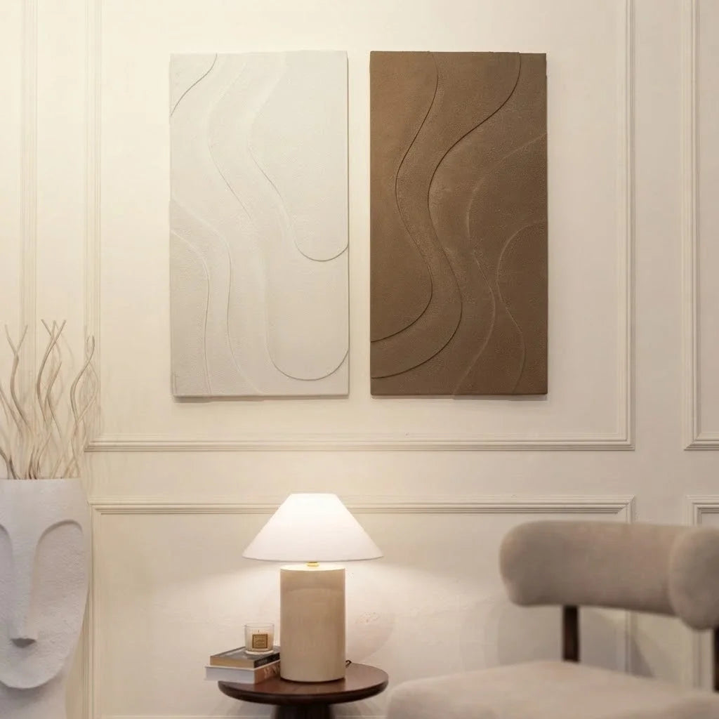 BOUCLE FLOW Wall Art hanging above a table lamp in a cozy neutral living room.