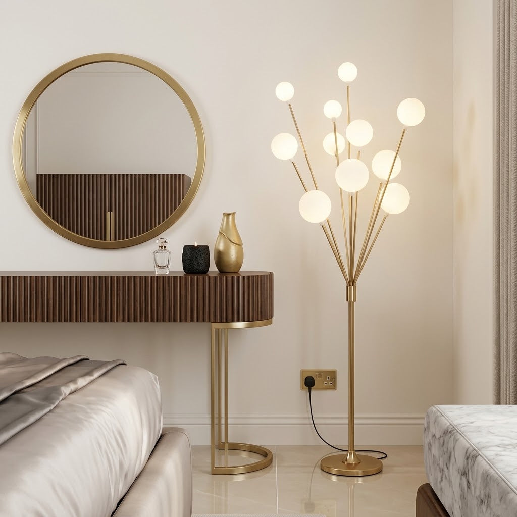 Modern multi globe floor lamp placed next to a luxury bedroom vanity setup.