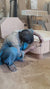 Behind-the-scenes video of craftsmen manufacturing a wooden ribbed center table with built-in storage drawers at Zama Home Store factory, showing wood assembly, polishing, and final packaging