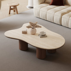 Modern coffee table with decorative items in a living room setting