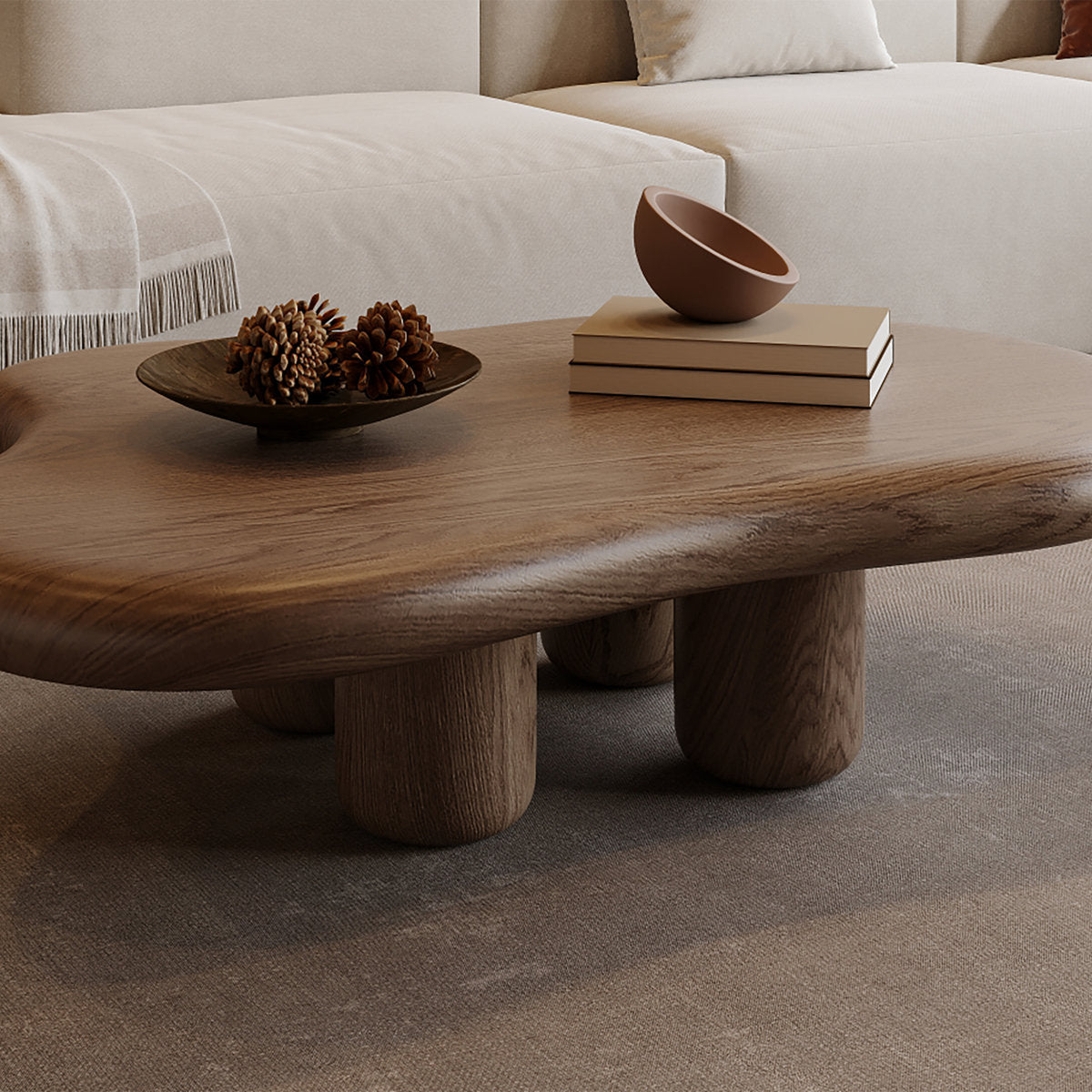 Wooden coffee table with decorative items in a living room setting
