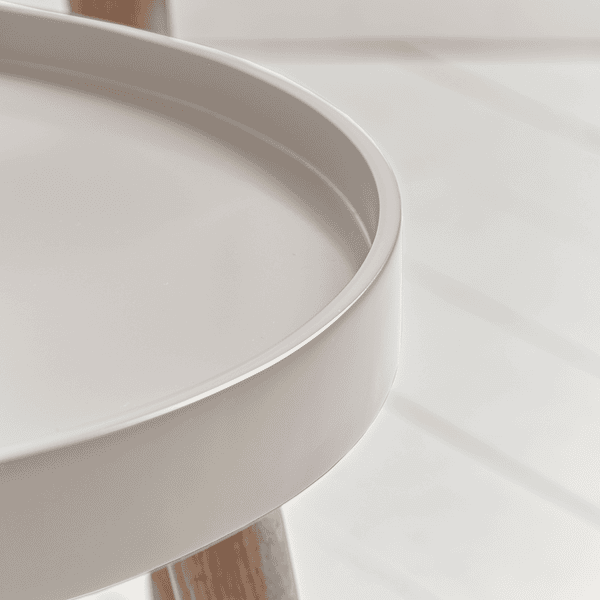 Close-up of a modern side table with a minimalist design.
