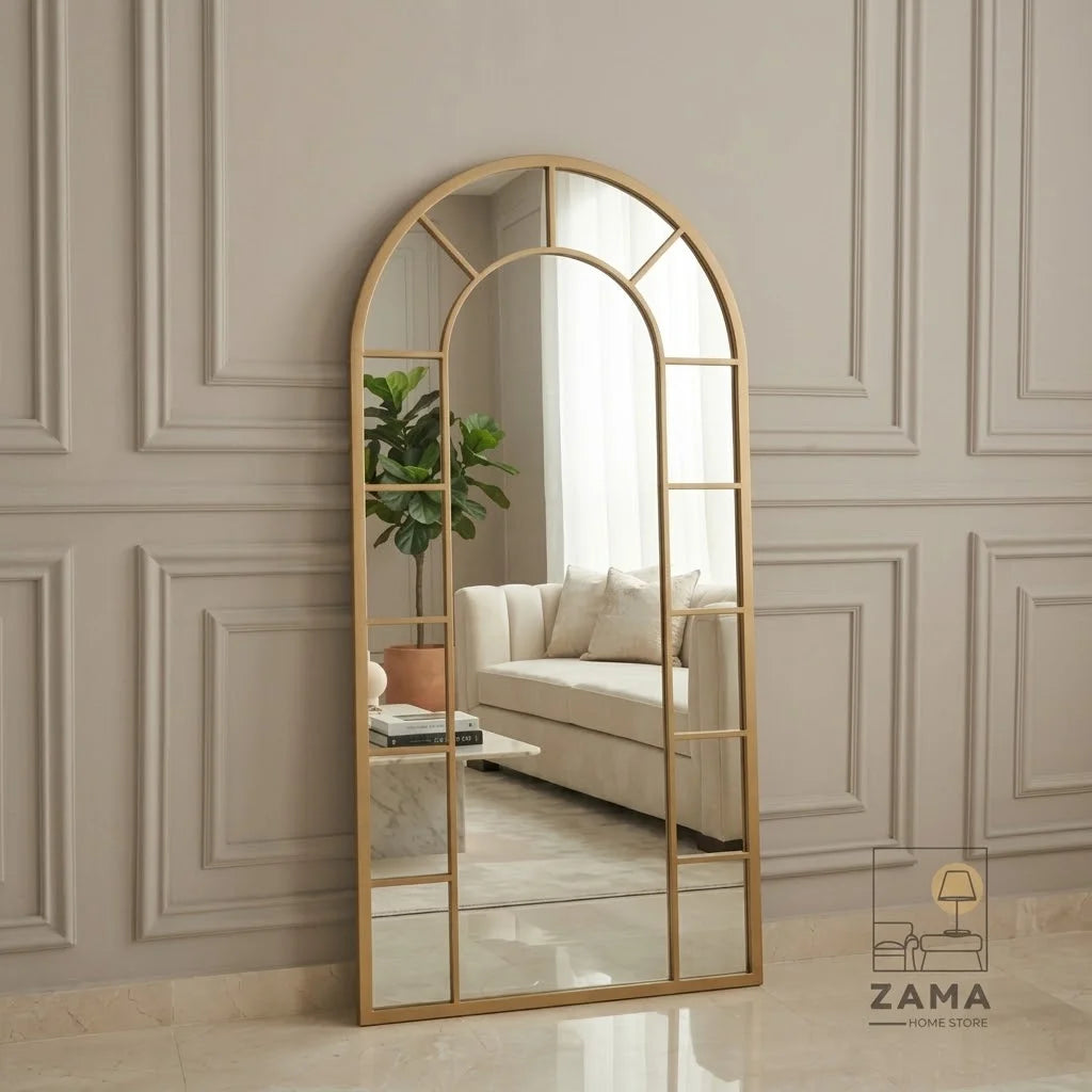 Arch top grid standing mirror by Zama Home Store leaning against a beige wall in a luxury room