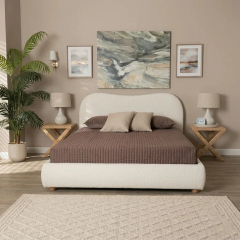 White Brosky king size bed by Zama Home Store in a beige bedroom with plants and wall art