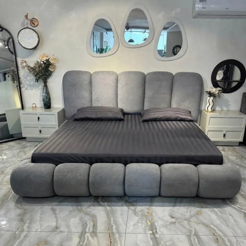 Front view of Zama Home Store Bubble Bed in a modern bedroom with side tables