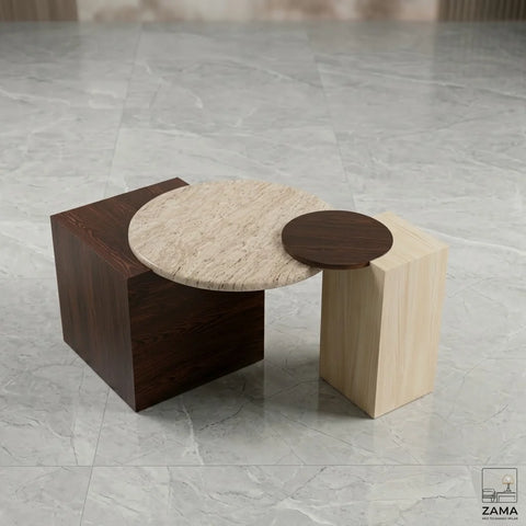 Modern nesting table set by Zama Home Store with travertine top on a marble floor