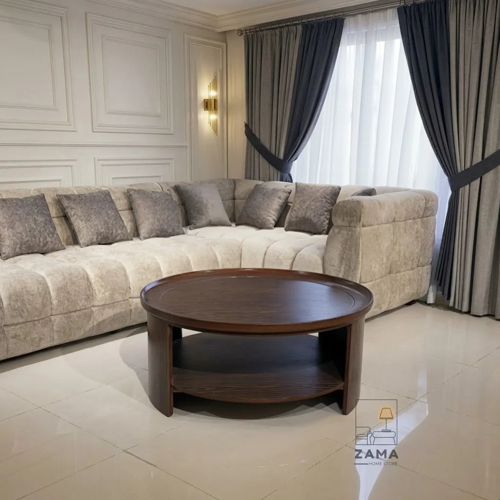 Modern oval center table by Zama Home Store in a luxury living room with a cream sofa