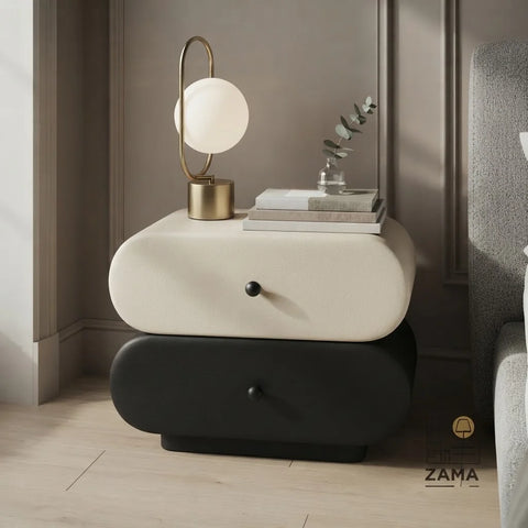 Nova capsule side table by Zama Home Store in cream and black beside a bed